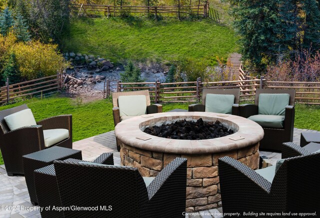 view of patio featuring a fire pit