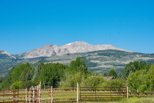 property view of mountains featuring a rural view