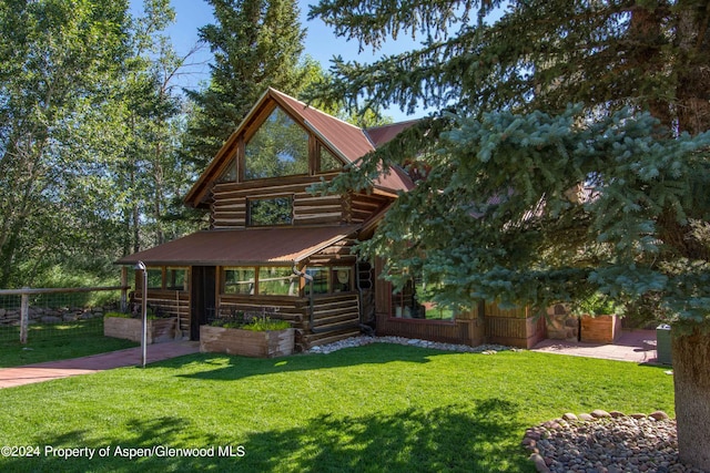 1150 Capitol Creek Rd, Snowmass, CO 81654 - cabin with log exterior and a metal roof