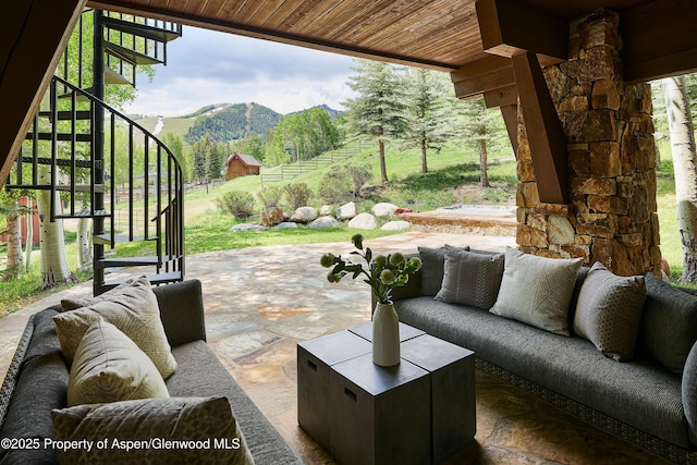 611 Oregon Trl, Aspen, CO 81611 - view of patio / terrace with stairway, an outdoor hangout area, and a mountain view