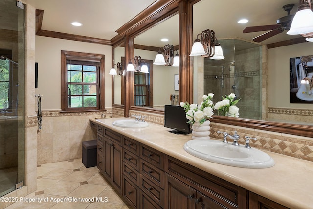 611 Oregon Trl, Aspen, CO 81611 - full bath featuring tile walls, tile patterned floors, a stall shower, double vanity, and ceiling fan