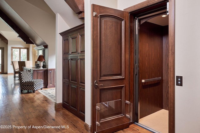 611 Oregon Trl, Aspen, CO 81611 - corridor featuring dark wood-type flooring and baseboards