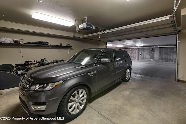 611 Oregon Trl, Aspen, CO 81611 - garage featuring a garage door opener
