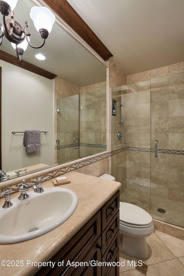 611 Oregon Trl, Aspen, CO 81611 - full bathroom with a stall shower, vanity, tile patterned floors, and a chandelier
