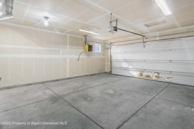 garage featuring a garage door opener