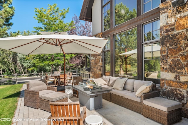 11 Pinon Ln, Carbondale, CO 81623 - view of patio / terrace featuring an outdoor living space with a fire pit, a wooden deck, and outdoor dining area