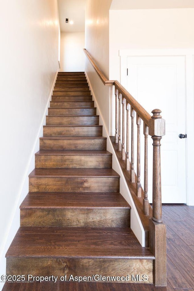 682 Eagles Nest Dr, Silt, CO 81652 - staircase featuring wood finished floors