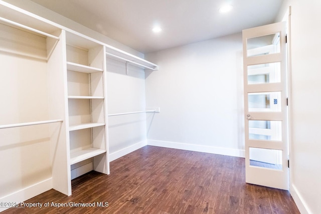 682 Eagles Nest Dr, Silt, CO 81652 - walk in closet with dark wood-type flooring