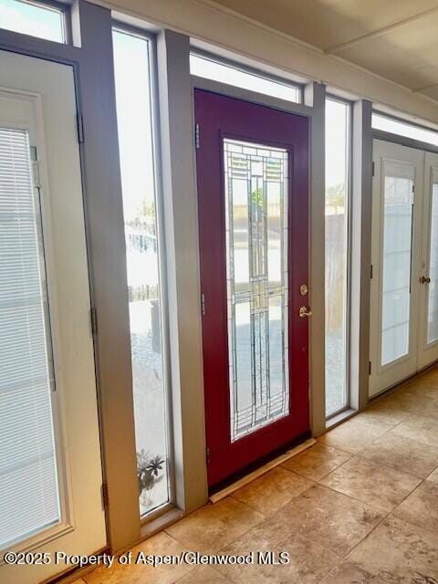 337 W Ave, Rifle, CO 81650 - entrance foyer featuring french doors and light tile patterned flooring