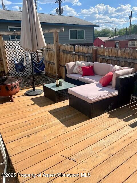 337 W Ave, Rifle, CO 81650 - wooden terrace featuring an outdoor hangout area