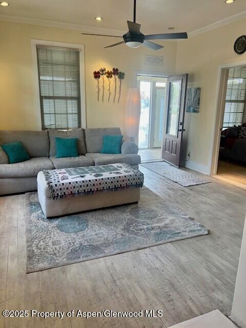 337 W Ave, Rifle, CO 81650 - living room with crown molding, a ceiling fan, wood finished floors, and recessed lighting