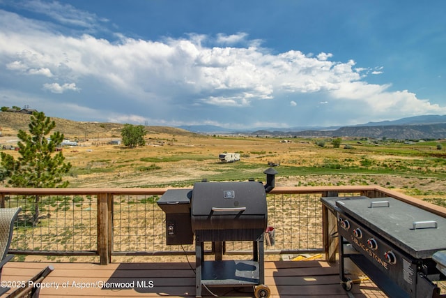 22 Booms Pl, Rifle, CO 81650 - wooden terrace with a view of countryside, a mountain view, and area for grilling