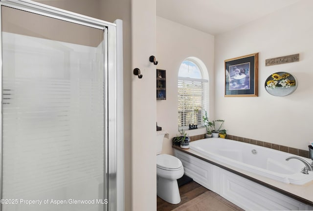 22 Booms Pl, Rifle, CO 81650 - full bathroom featuring a stall shower and a garden tub