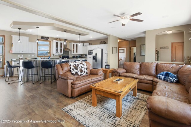 22 Booms Pl, Rifle, CO 81650 - living area with ceiling fan and wood finished floors