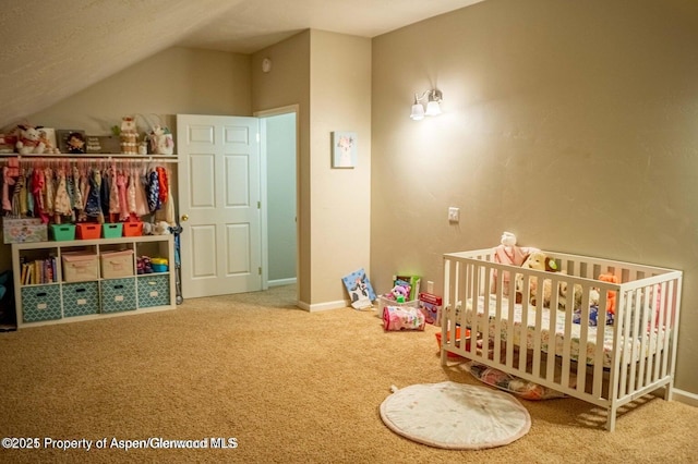 337 E 5 Th St, Rifle, CO 81650 - bedroom featuring carpet flooring, lofted ceiling, a crib, and a closet