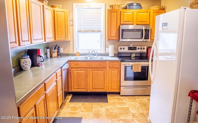 337 E 5 Th St, Rifle, CO 81650 - kitchen featuring stainless steel appliances and a sink