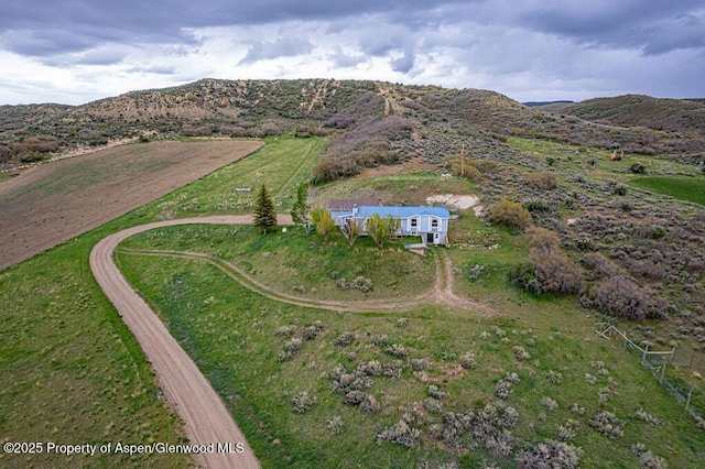 3598 County Road 35, Craig, CO 81625 - aerial overview of property's location featuring rural landscape and mountains