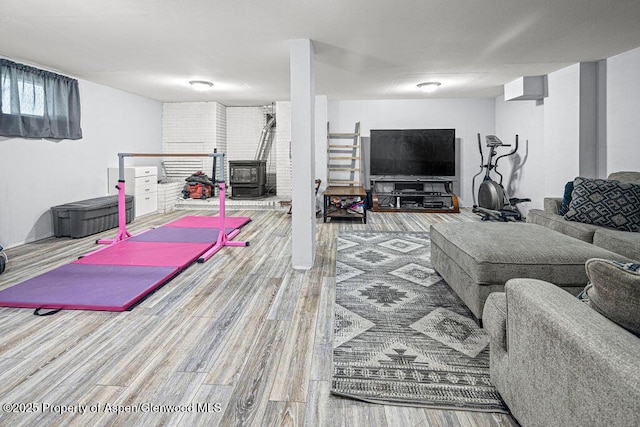 3598 County Road 35, Craig, CO 81625 - living area with a wood stove and wood finished floors
