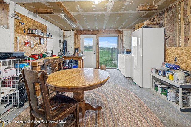 3598 County Road 35, Craig, CO 81625 - dining area featuring a workshop area and concrete flooring