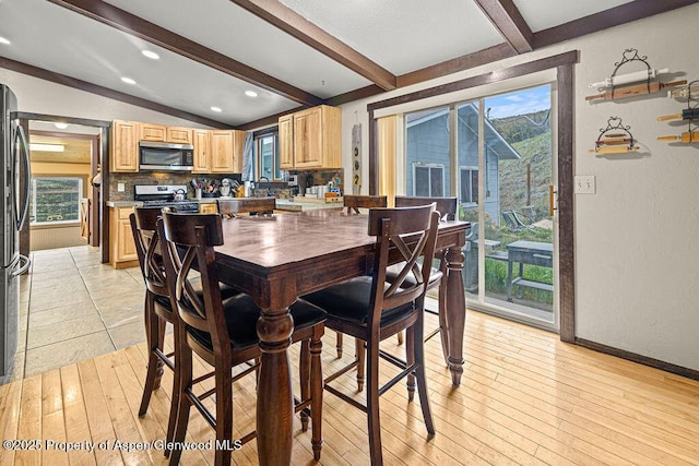 3598 County Road 35, Craig, CO 81625 - dining room with plenty of natural light, light wood finished floors, baseboards, and recessed lighting
