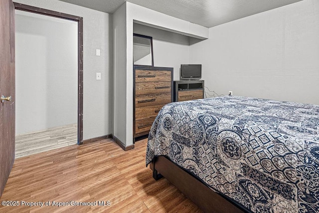 3598 County Road 35, Craig, CO 81625 - bedroom with light wood-type flooring and baseboards