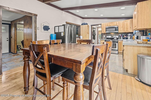 3598 County Road 35, Craig, CO 81625 - dining area with beamed ceiling, recessed lighting, and light wood-type flooring