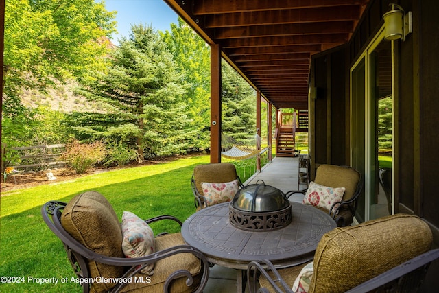 view of patio with an outdoor fire pit