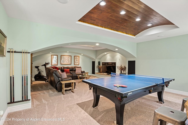 rec room with wooden ceiling, carpet floors, brick ceiling, and vaulted ceiling