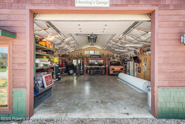 garage with wood walls