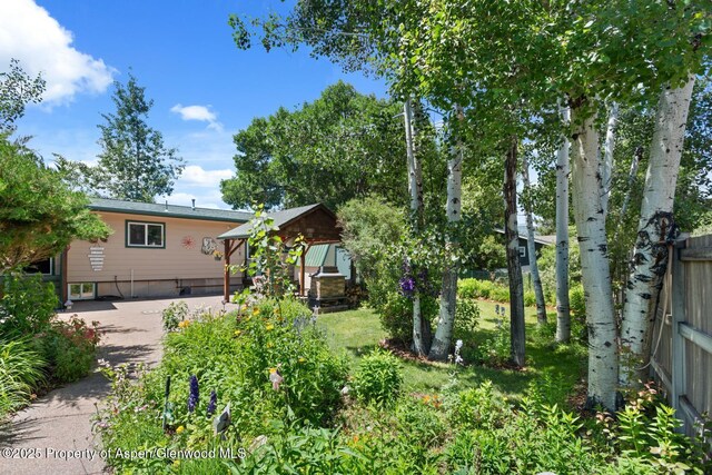 view of yard with fence