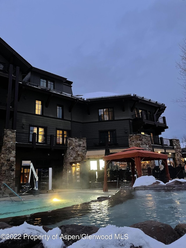 view of snow covered pool