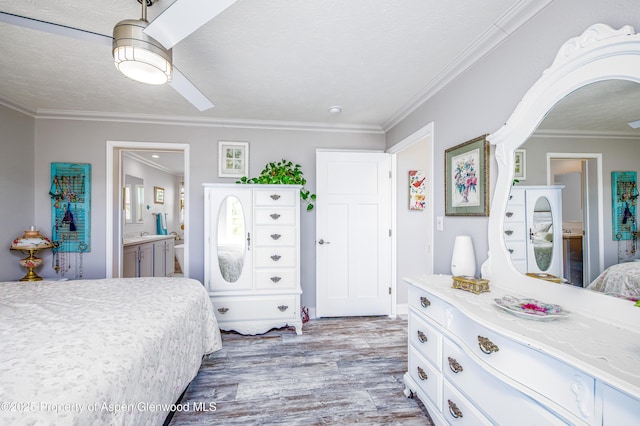 10155 6400th Rd, Montrose, CO 81401 - bedroom with a textured ceiling, ensuite bathroom, wood finished floors, a ceiling fan, and crown molding