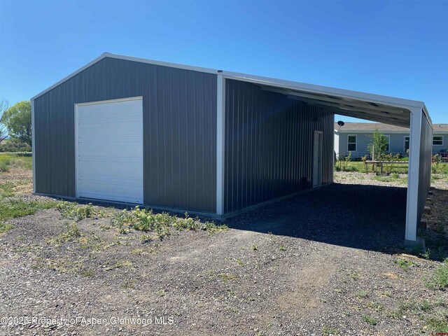 10155 6400th Rd, Montrose, CO 81401 - view of outdoor structure with an outbuilding