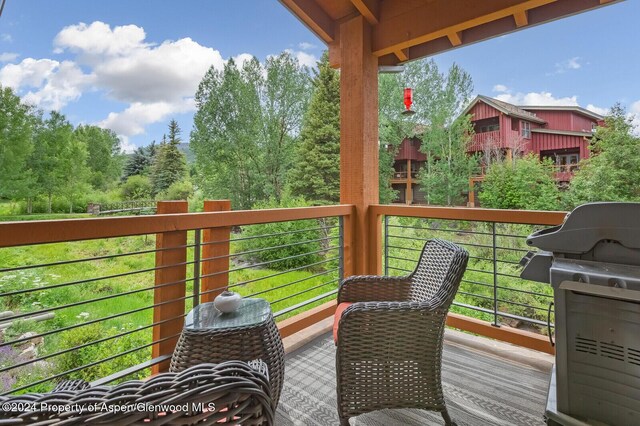 106 Clubhouse Dr Unit 180, Snowmass Village, CO 81615 - wooden terrace featuring area for grilling
