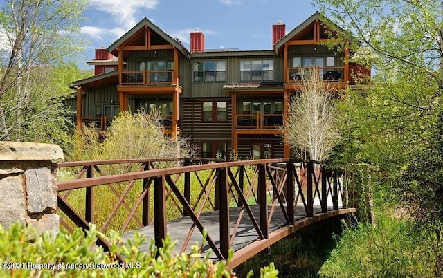106 Clubhouse Dr Unit 180, Snowmass Village, CO 81615 - rear view of house with a balcony