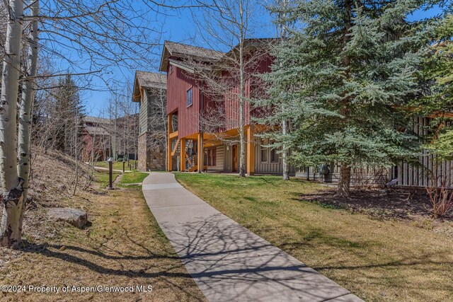 106 Clubhouse Dr Unit 180, Snowmass Village, CO 81615 - view of front facade with a front yard