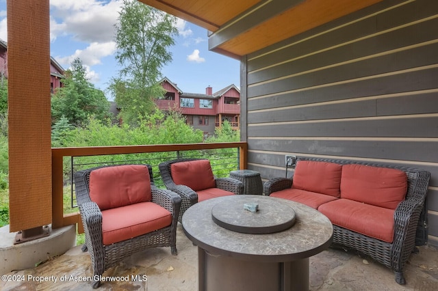 view of patio / terrace featuring outdoor lounge area and a balcony