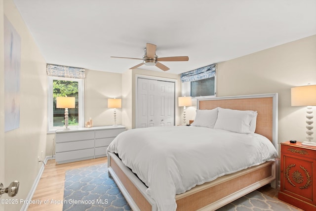 650 S Monarch St Unit 10, Aspen, CO 81612 - bedroom with wood finished floors, a closet, ceiling fan, and baseboards
