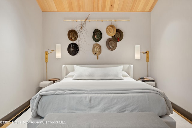 411 Wood Rd Unit 10, Snowmass Village, CO 81615 - bedroom featuring wooden ceiling and vaulted ceiling