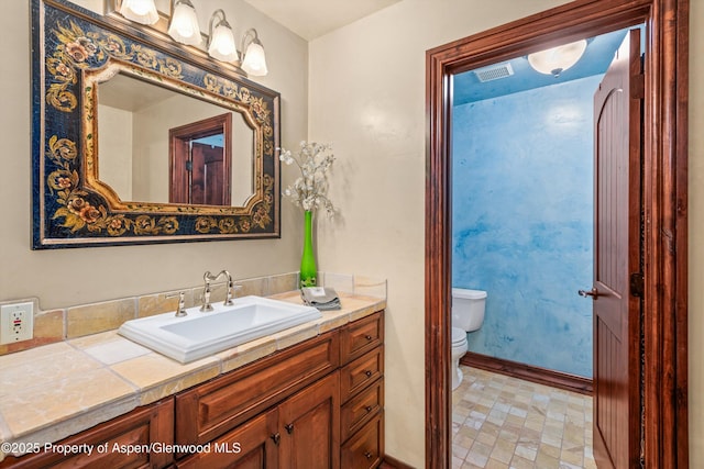 845 Hillcrest Dr, Basalt, CO 81621 - bathroom with toilet, vanity, and baseboards