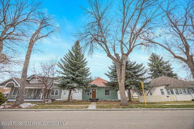 view of front of property with fence
