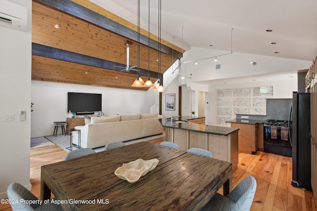 dining room with high vaulted ceiling, sink, light hardwood / wood-style flooring, beamed ceiling, and a wall unit AC