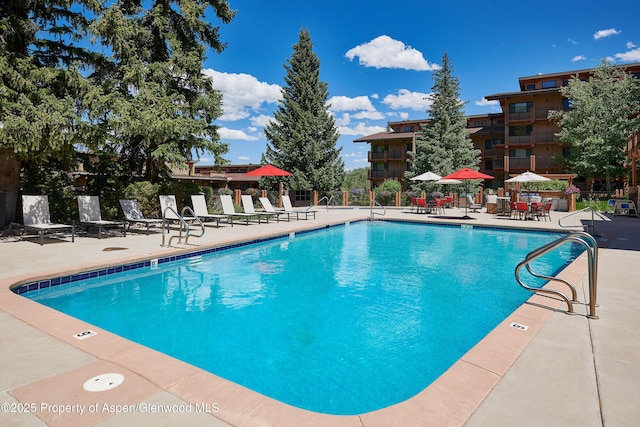 65 Campground Ln Unit 94, Snowmass Village, CO 81615 - community pool with a patio area