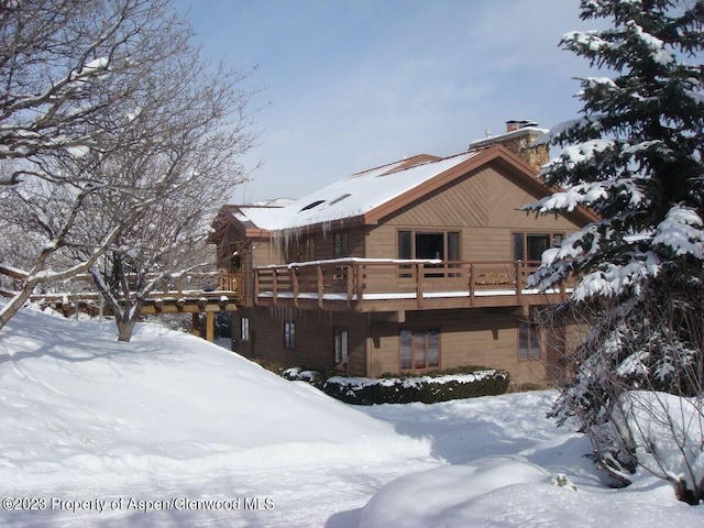 view of snow covered property