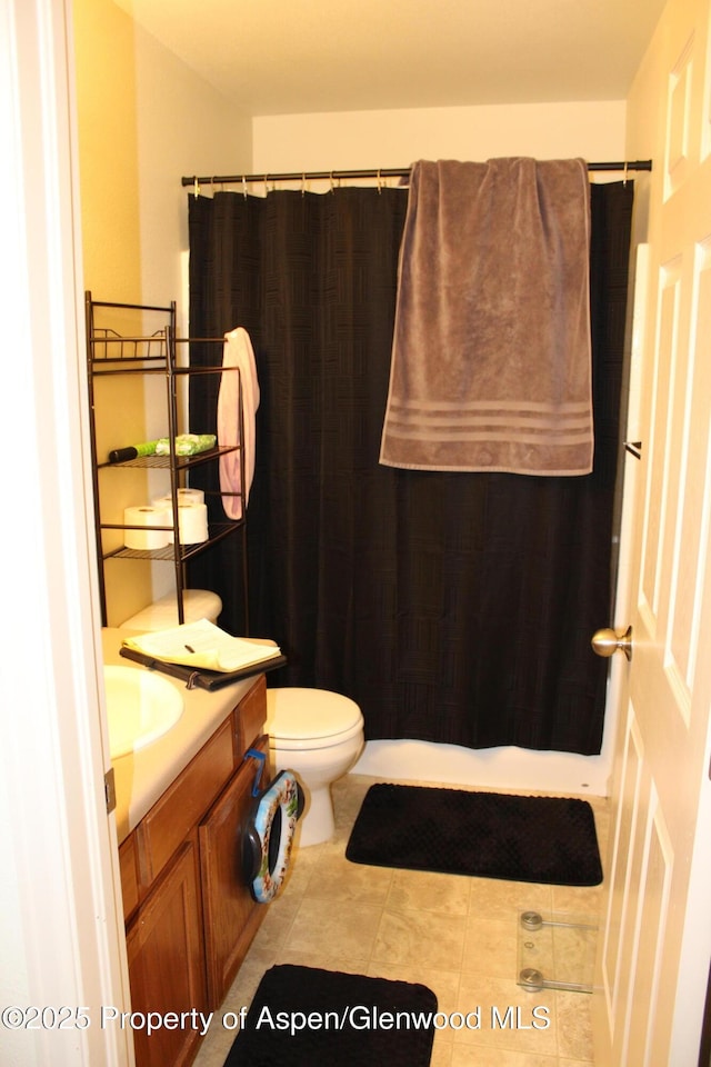 460 Yarrow Cir, Parachute, CO 81635 - full bath with vanity, tile patterned floors, and a shower with shower curtain
