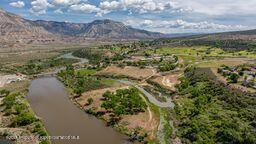 8984 County Road 300, Parachute, CO 81635 - mountain view with a nearby body of water
