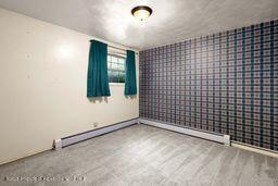 8984 County Road 300, Parachute, CO 81635 - unfurnished room with wallpapered walls