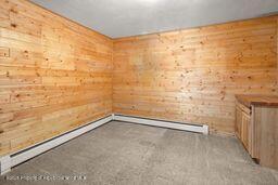 8984 County Road 300, Parachute, CO 81635 - unfurnished room with wooden walls