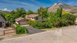 8984 County Road 300, Parachute, CO 81635 - view of front of property featuring asphalt driveway