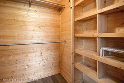 8984 County Road 300, Parachute, CO 81635 - spacious closet featuring dark wood-style flooring